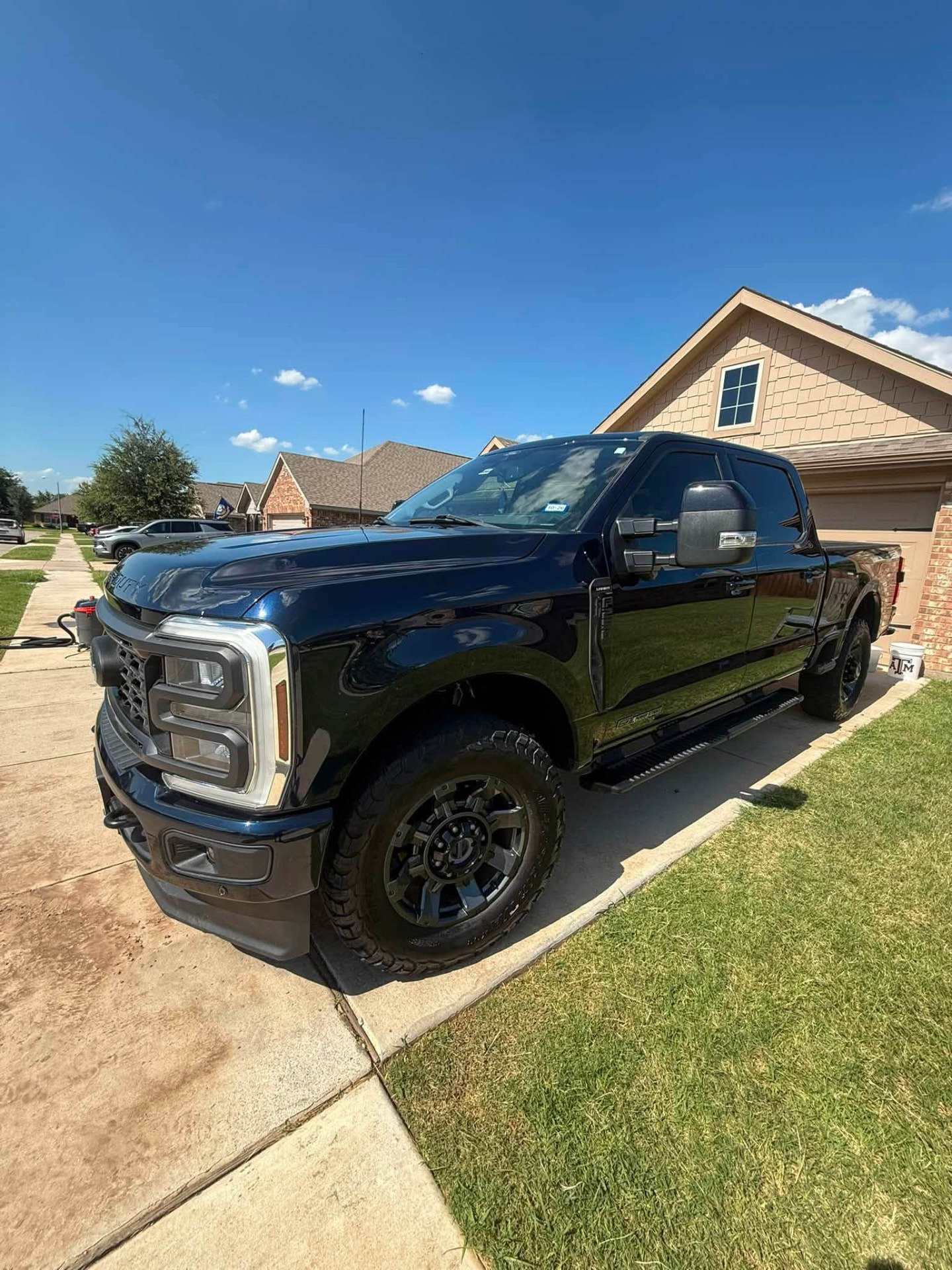 Black Ford Super Duty after a full exterior wash and seal